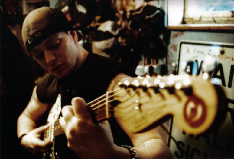 Chris playing guitar